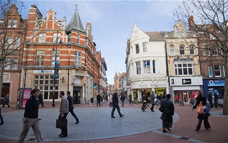 people walking down a street